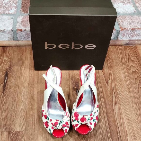 This is a pair of Bebe brand high-heeled sandals. - Picture 1 of 3